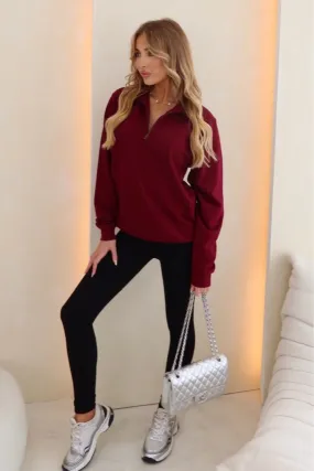 Kelly burgundy 3/4 zip sweater and black ribbed leggings